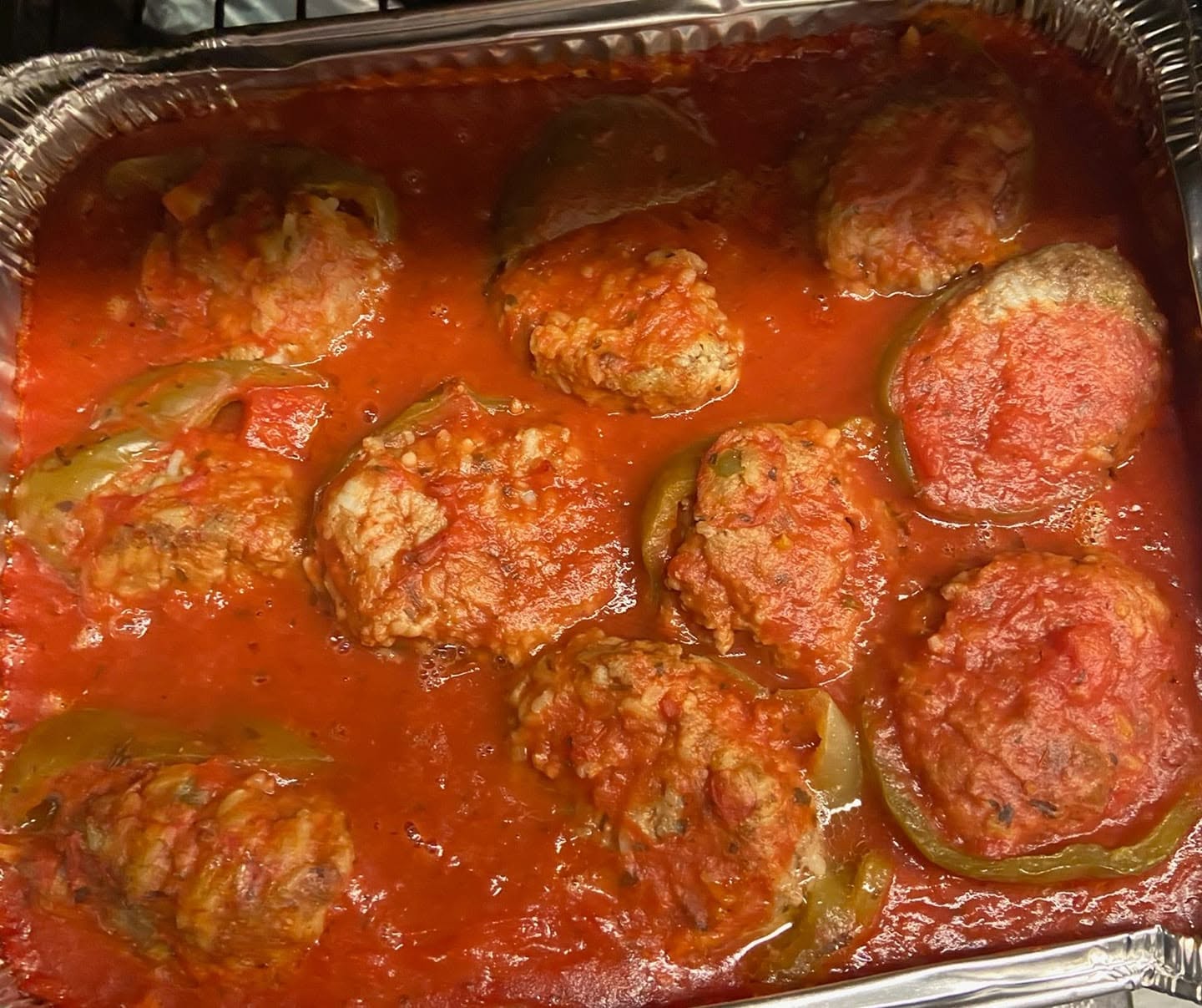 Homemade stuffed green peppers in tomato sauce at Bev's Restaurant